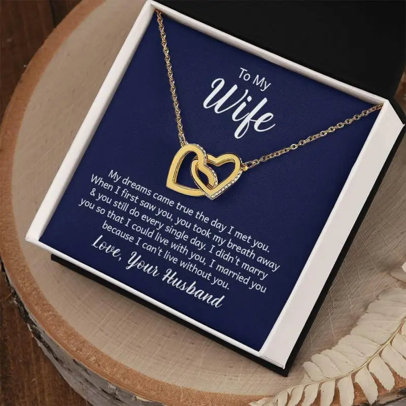 Gold interlocking hearts necklace in a gift box with a romantic message for your wife