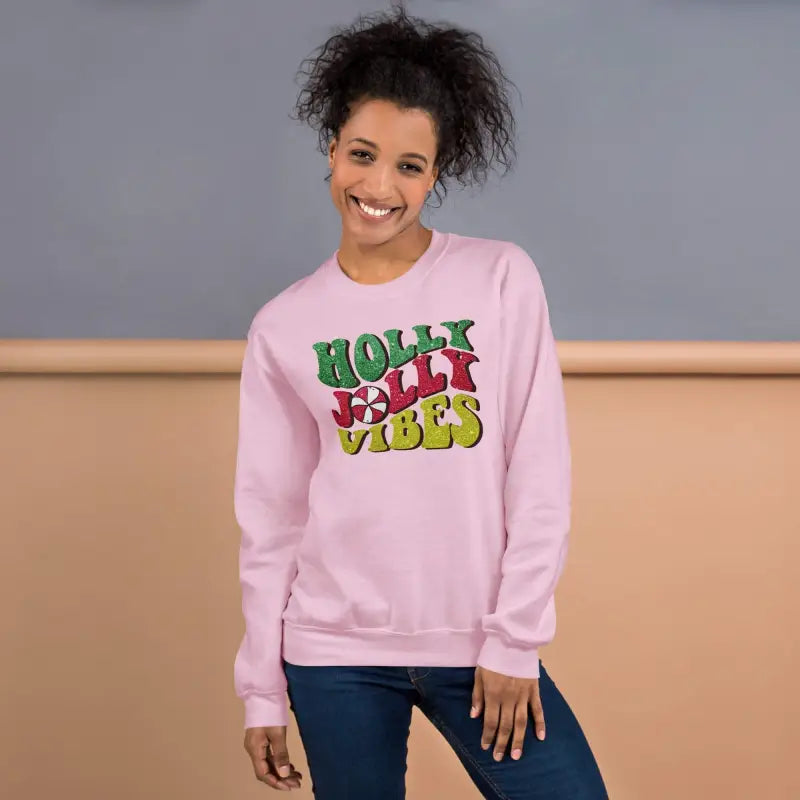 Pink vibes Christmas sweatshirt with Holly Jolly Vibes text in colorful letters