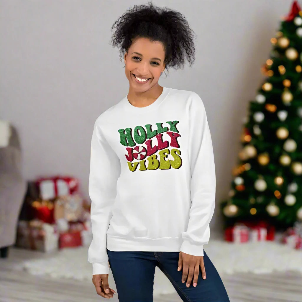White sweatshirt with Holly Jolly Vibes print for cozy vibes Christmas fun