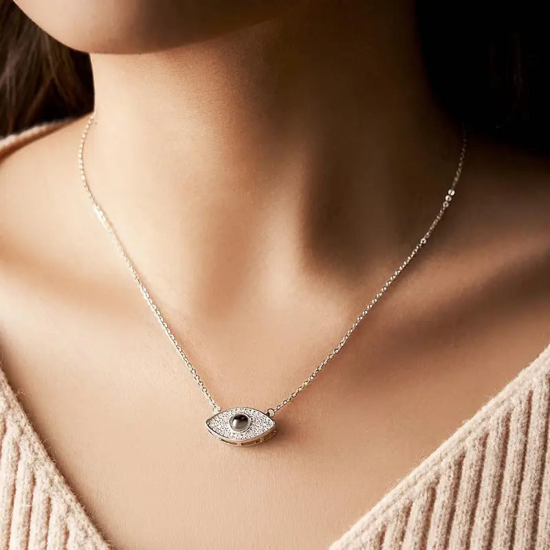 Silver Evil Eye Projection Necklace with blue gemstone pendant for custom photo projection