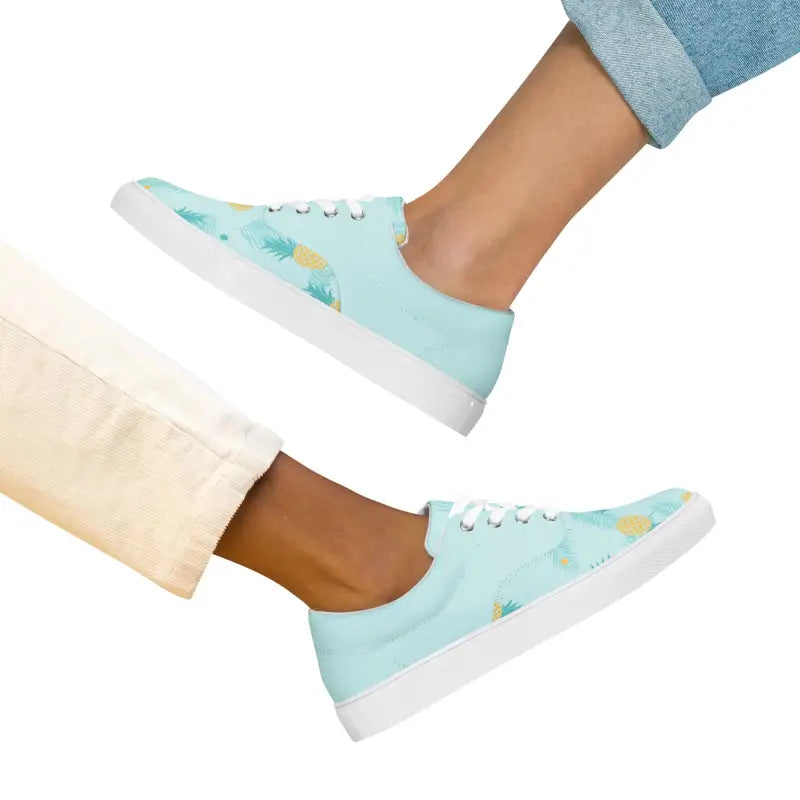 Light blue women’s pineapple lace-up canvas sneakers with pastel accents and white soles