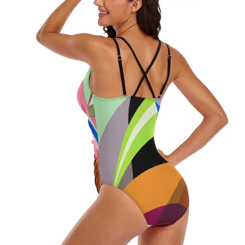 Colorful green abstract pattern one-piece swimsuit with stylish criss-cross back straps