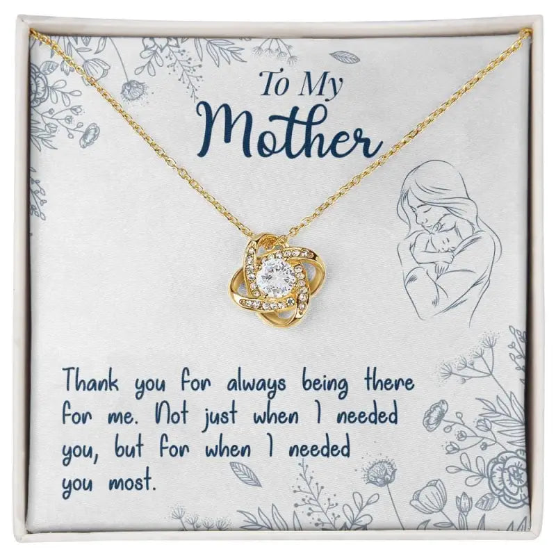 Beautiful 14k white gold necklace with flower-shaped pendant and gemstone