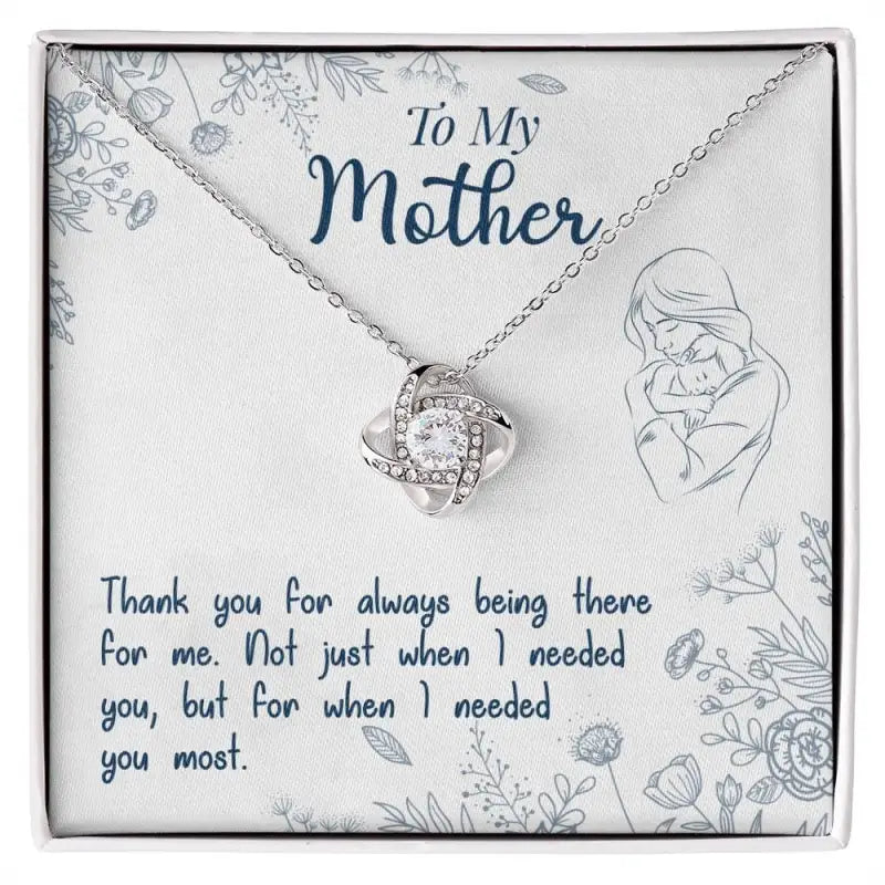 Beautiful Silver necklace with a knot pendant and gemstone in 14k white gold