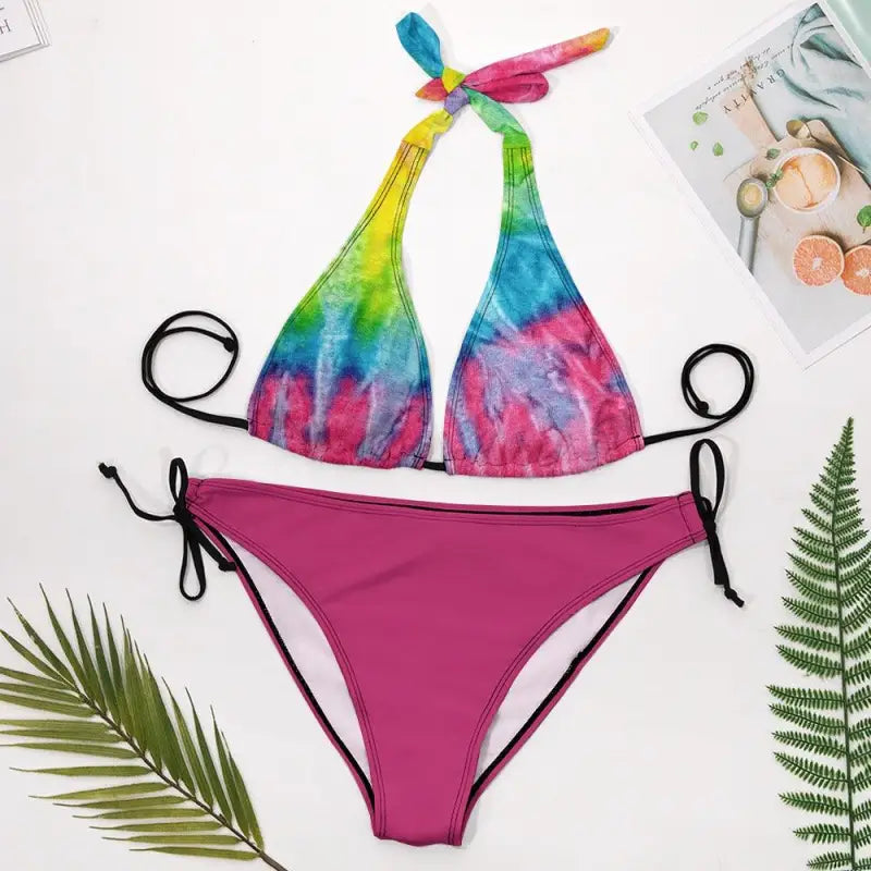 Colorful tie-dye halter bikini top with magenta bottom in a multi color bikini vibe
