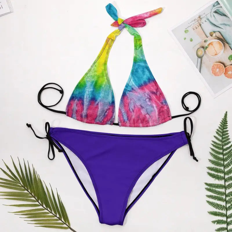 Colorful tie-dye bikini top with solid purple bottoms, perfect multi color bikini look