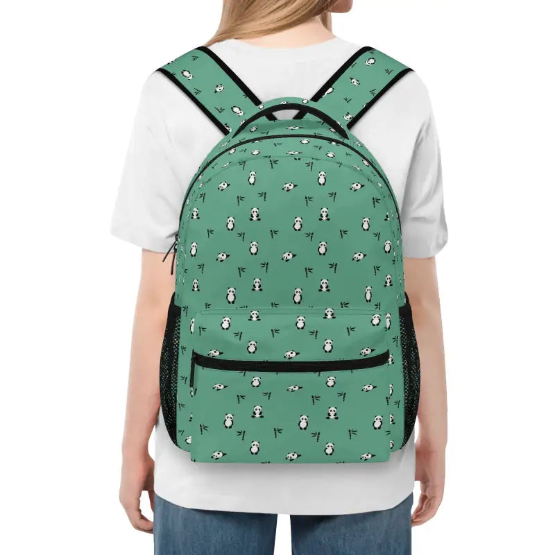 Green panda backpack with cute penguin pattern and multiple compartments for school