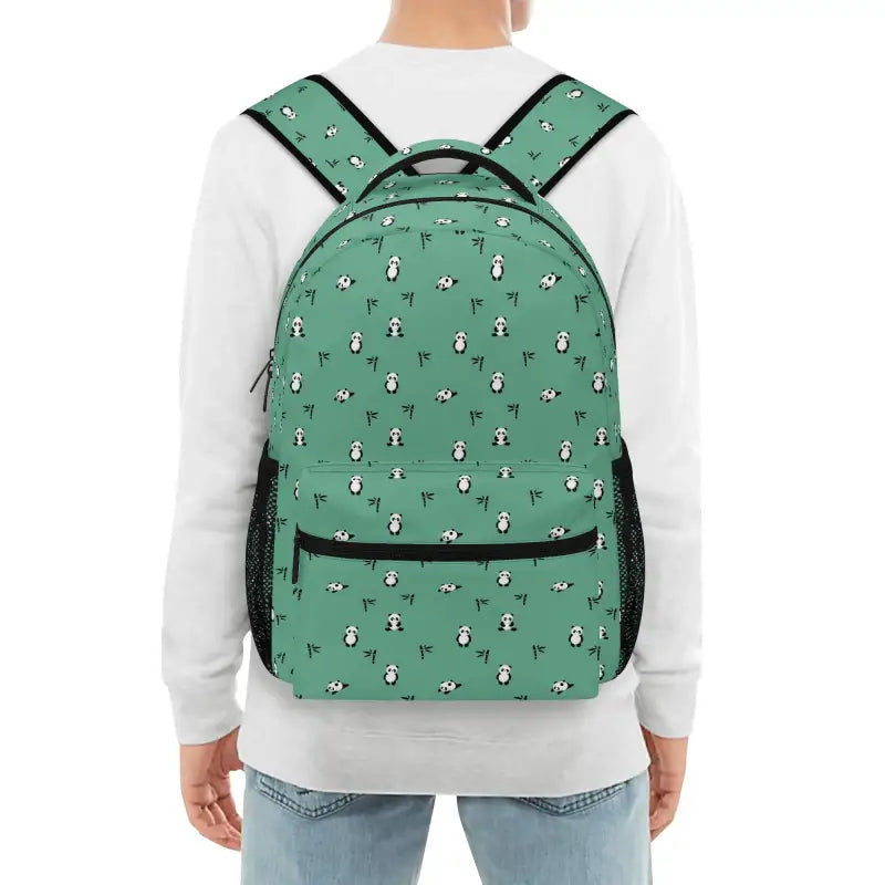 Green panda backpack with penguin pattern and multiple compartments for school fun