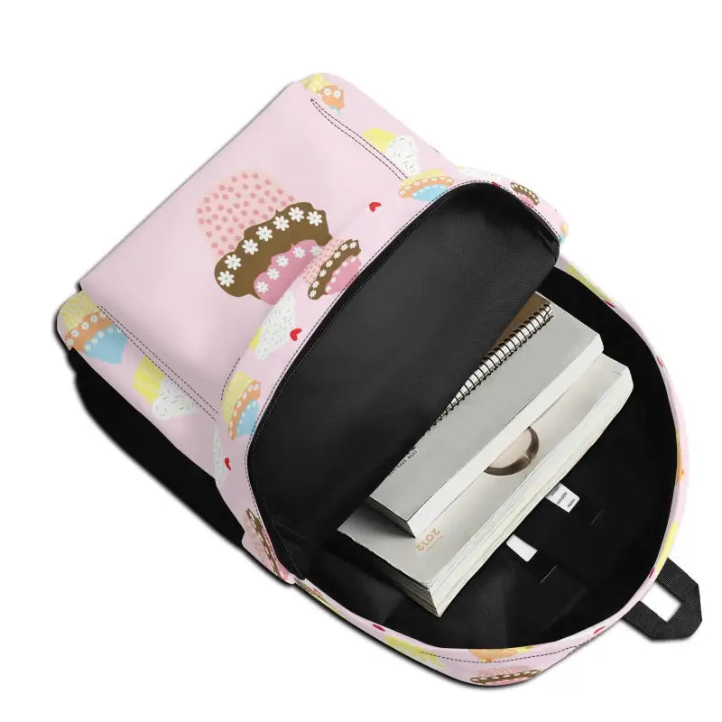 Pink Personalized Cupcake Backpack with patches and a white device peeking inside