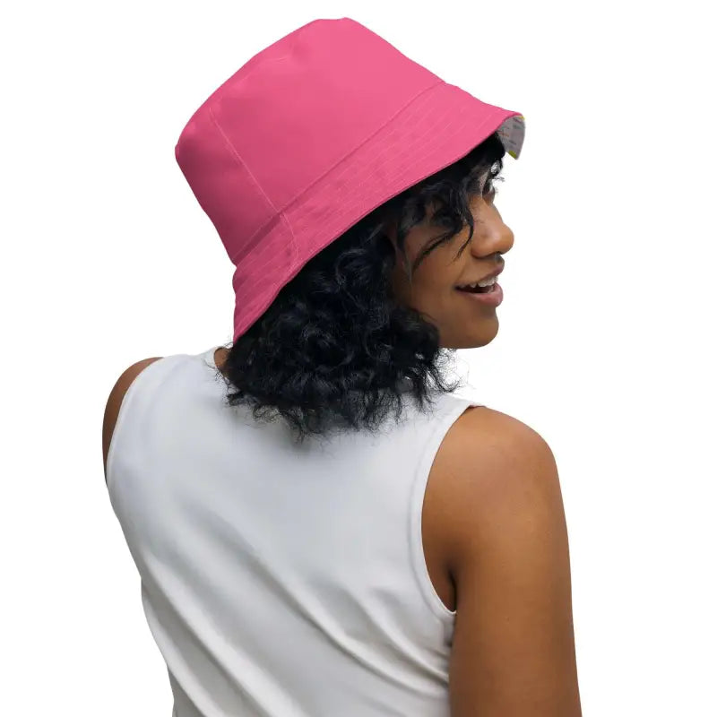 Bright pink polka dot reversible bucket hat perfect for stylish babes with curly hair