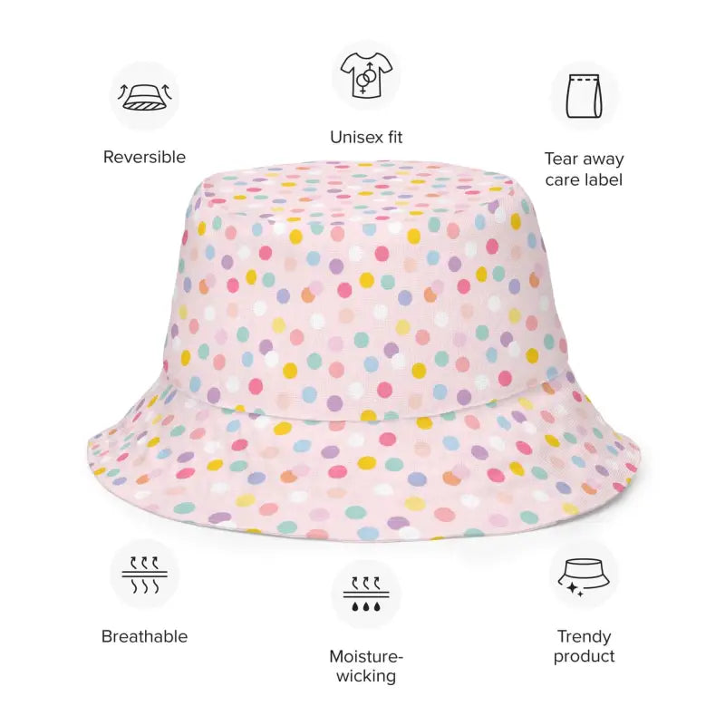 Polka dot reversible bucket hat with pastel spots on light pink, perfect for stylish babes