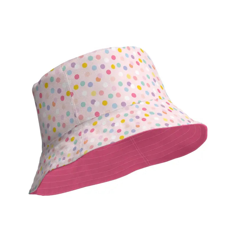 Polka dot reversible bucket hat featuring a cute pink underside for trendy babes