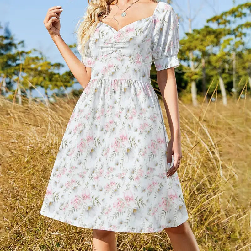 Floral print white dress with puff sleeves and sweetheart neckline for women’s pink floral style