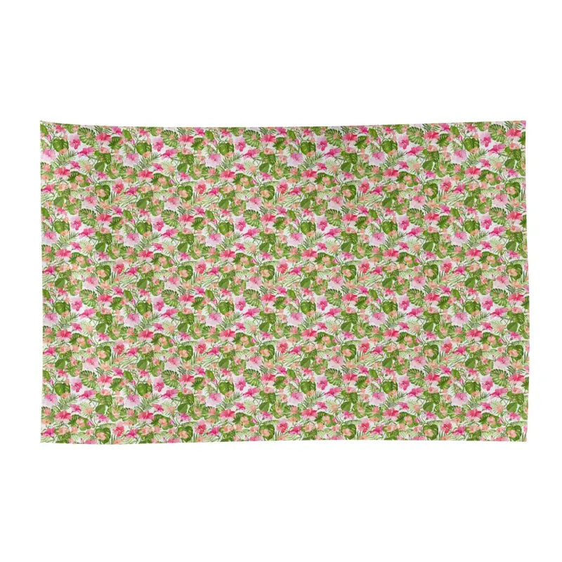 Floral fabric with pink flowers and green leaves for womens tropical Hawaiian style