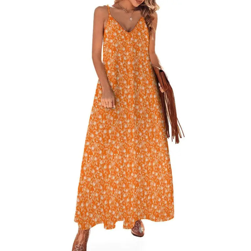 Orange floral print maxi dress with spaghetti straps perfect for a chic floral ankle look