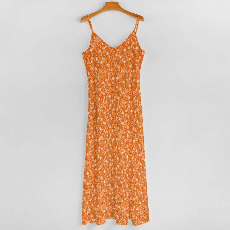 Orange floral print spaghetti strap maxi dress on a wooden hanger for stylish looks