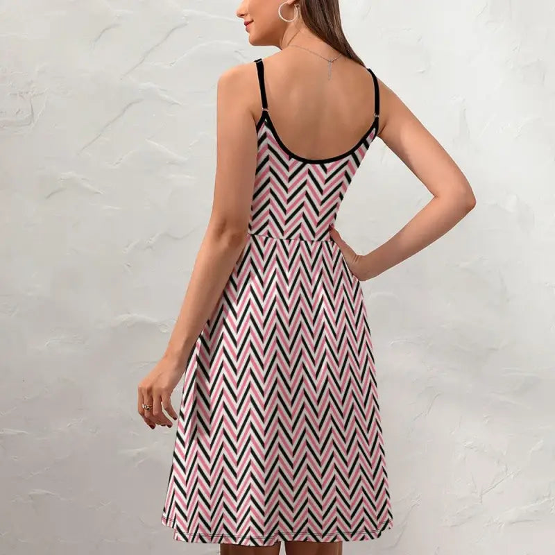 Sleeveless women’s chevron slip dress in pink, black, and white for a fab night out