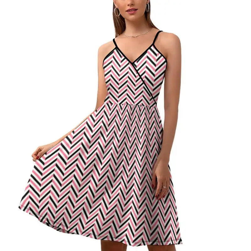 Sleeveless women’s chevron slip dress in pink, black, and white chevron pattern