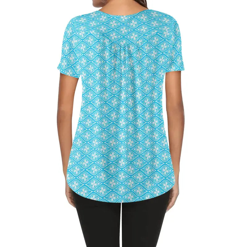 Turquoise short sleeve blue boho print blouse with a stylish white floral pattern