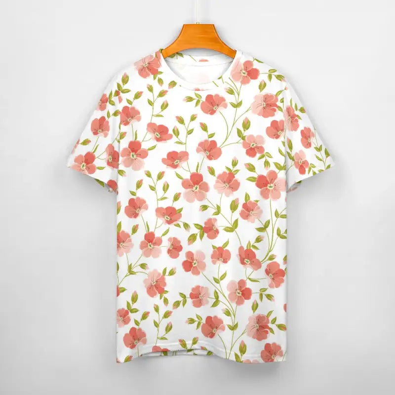 Floral t-shirt for women featuring pink flowers and green leaves on a white background
