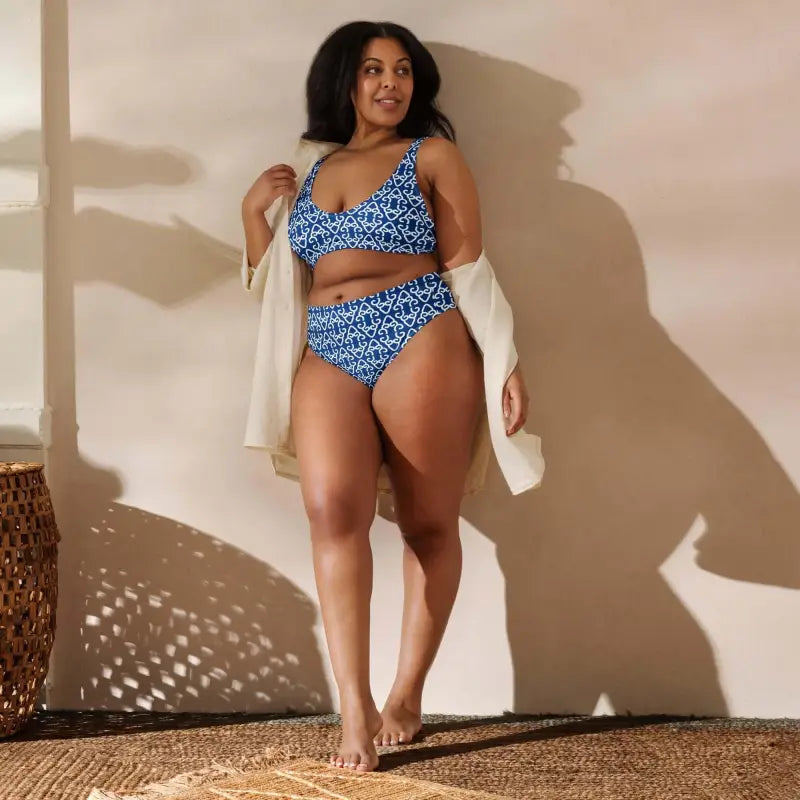 Woman in a blue boho high-waisted bikini with a cover-up, perfect for summer fun