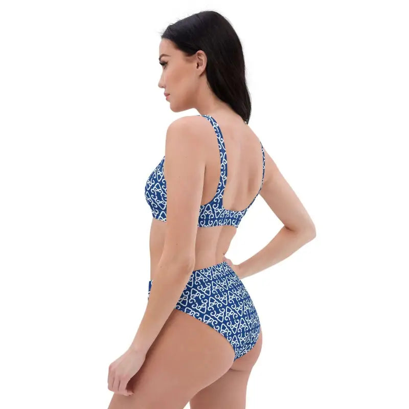 Woman with long dark hair models a stylish Blue Boho High-Waisted Bikini