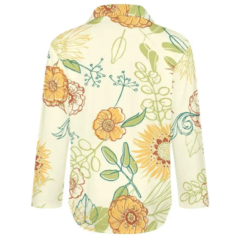 Floral-patterned long-sleeved women’s yellow floral blouse with bright botanical designs