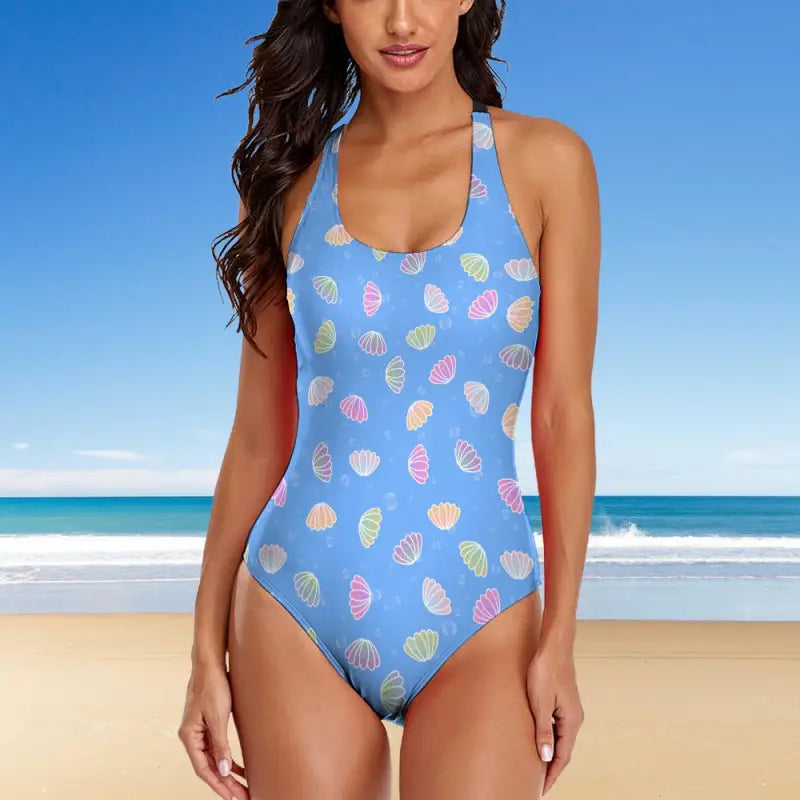 Light blue one piece swimsuit with criss cross back and charming shell pattern for ladies