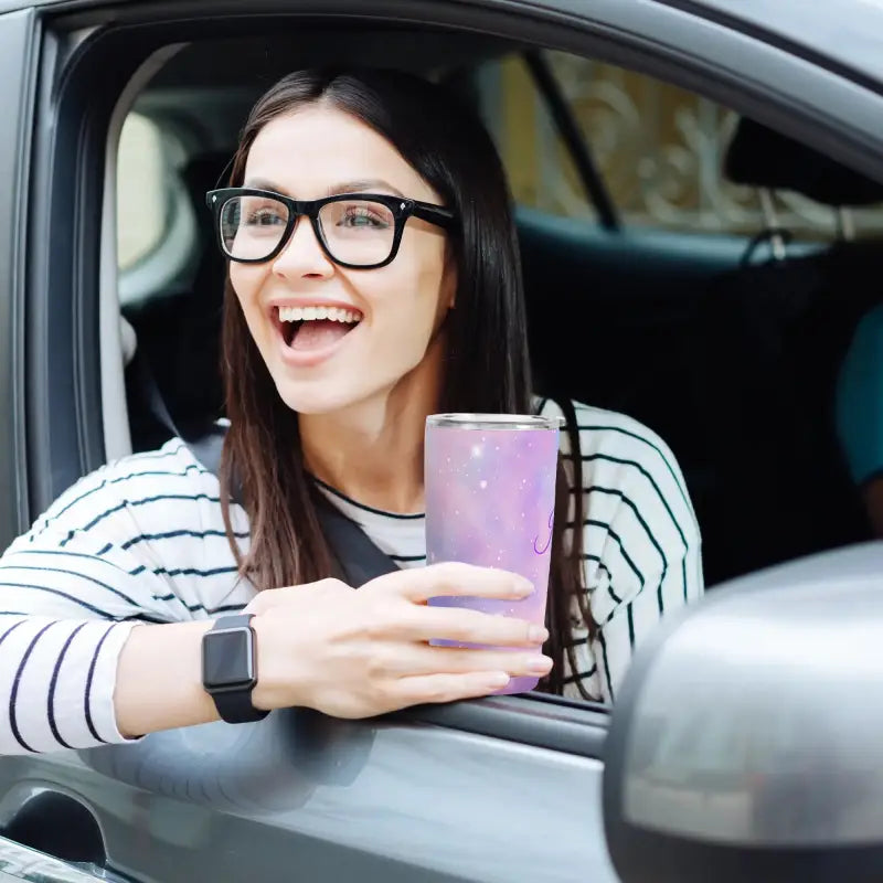 Smiling woman in a car with a Galaxy Personalized 20oz tumbler in her hand