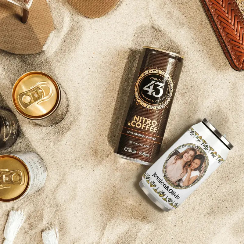 Can of Licor 43 Nitro Coffee liqueur next to personalized stainless steel tumbler with pictures