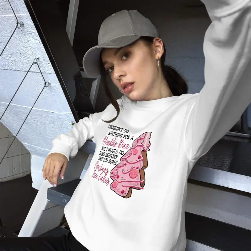 White sweatshirt with a pink Christmas tree snack design for tasty holiday fun