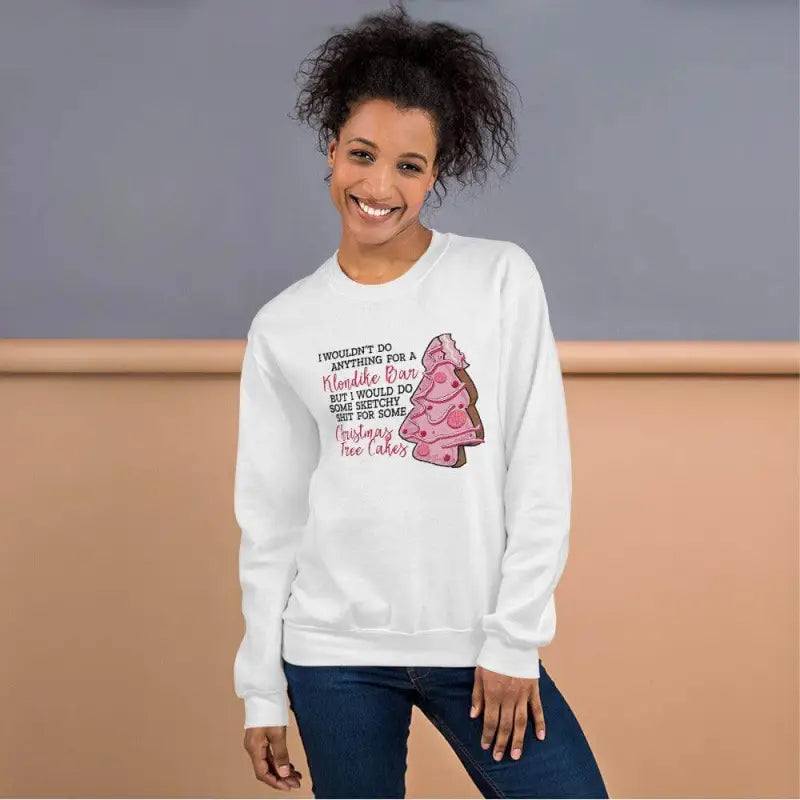 White sweatshirt featuring a pink Christmas tree snack design for festive fun
