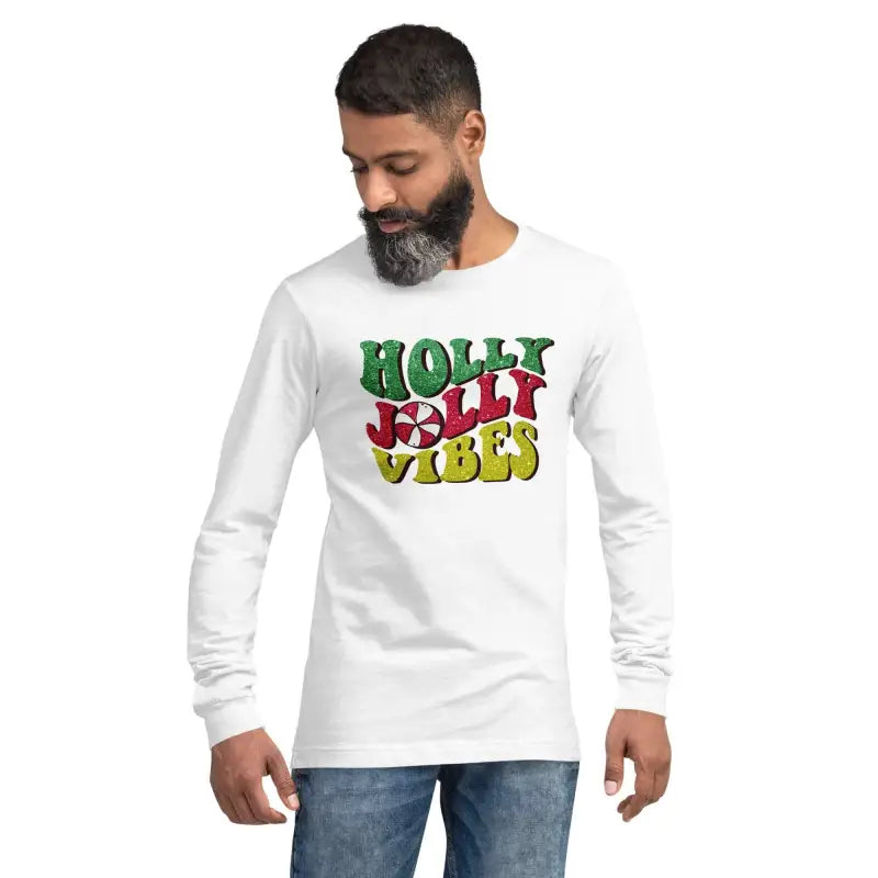 White long-sleeved tee featuring colorful Holly Jolly Vibes text for a cozy look