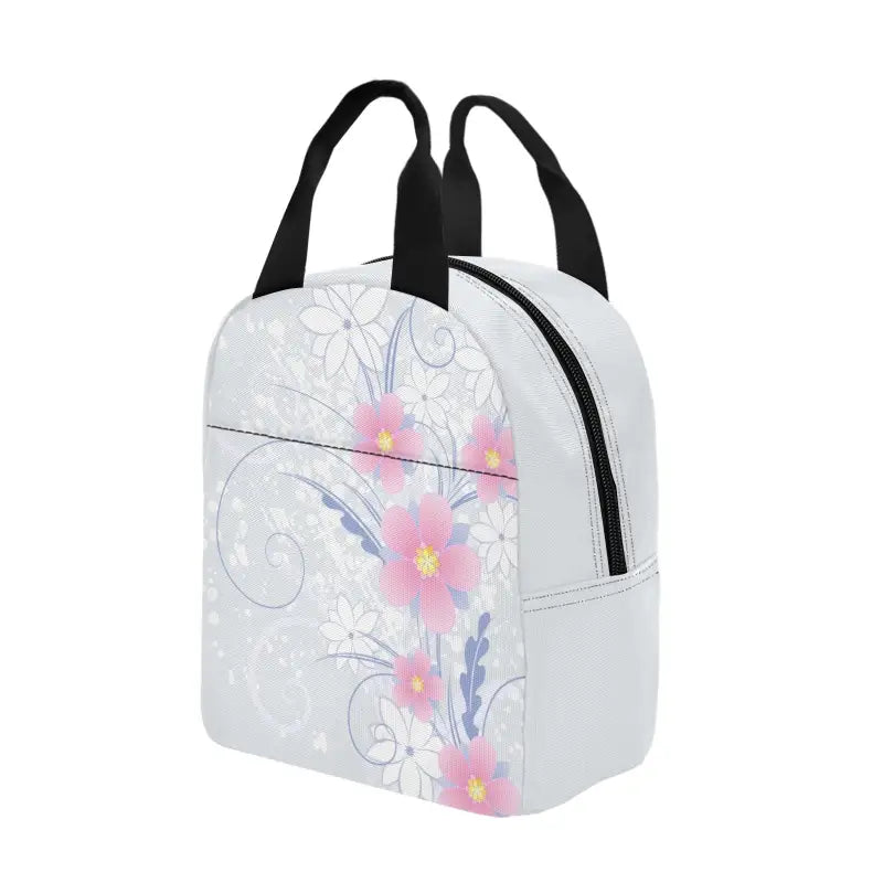 White floral insulated zipper lunch bag with black handles for stylish meal prep