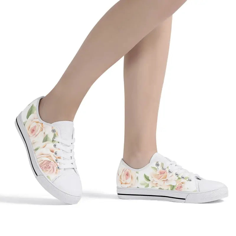 Pair of women’s rose print canvas shoes featuring a trendy floral design