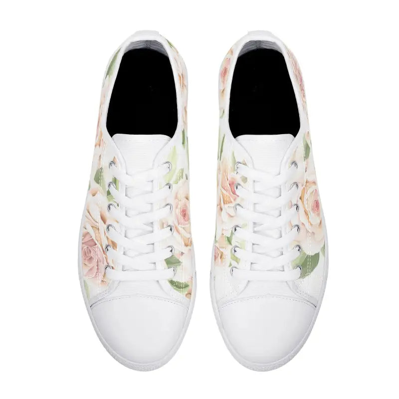 Stylish pair of women’s rose print canvas shoes with a floral design in white