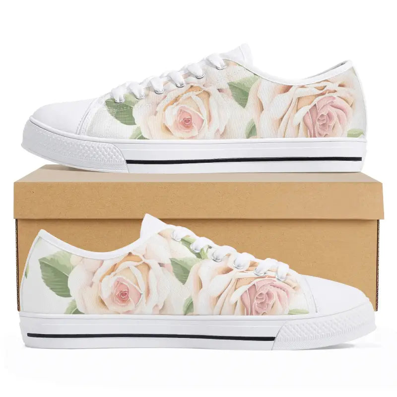 Floral-patterned women’s rose print canvas shoes with pale pink roses on white background