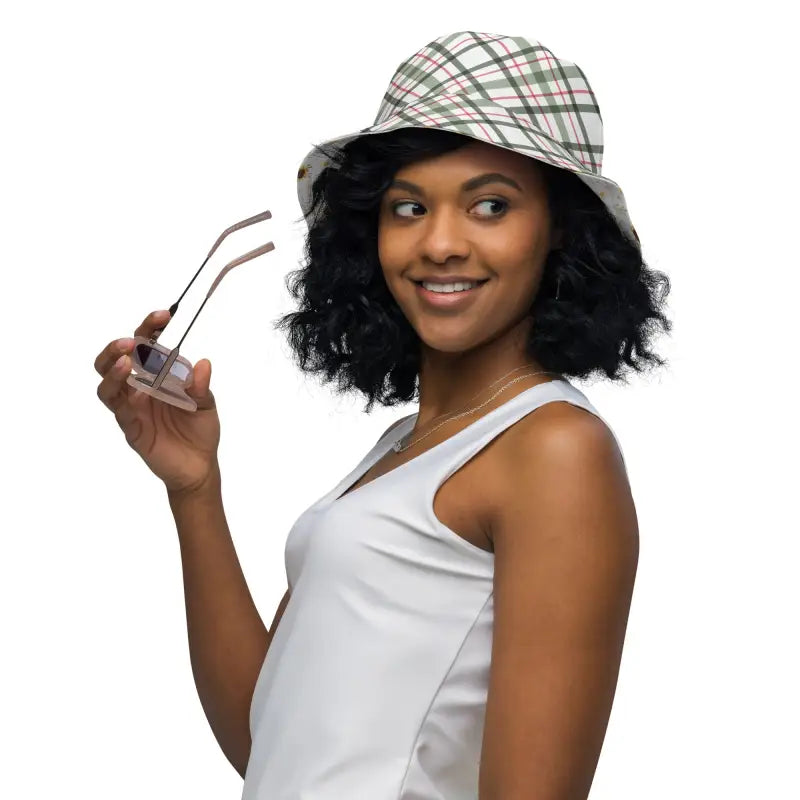 Smiling woman in plaid bucket hat showcasing the Sunflower Reversible Bucket Hat
