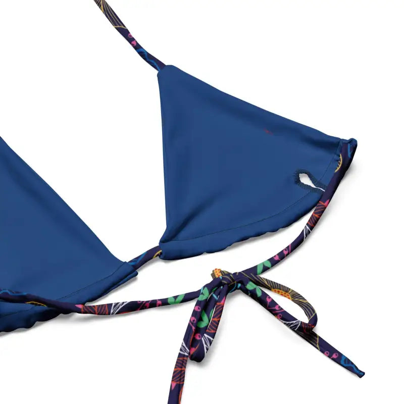 Blue floral string bikini top with a colorful patterned tie strap for vibrant beach days