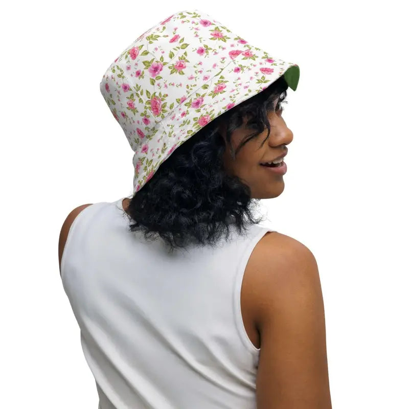 Floral print reversible bucket hat with a green underside and rose floral design