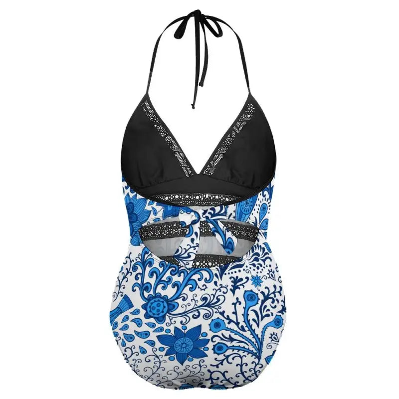 Halter-style swimsuit featuring a black top and size blue floral bottom design
