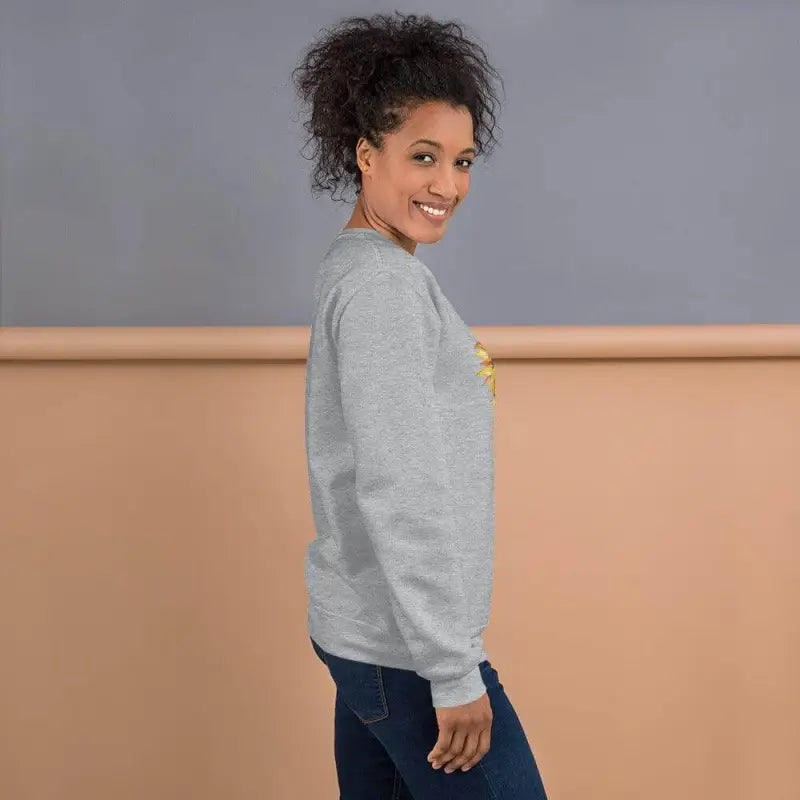 Gray women’s sunflower sweatshirt with a cute yellow graphic on the chest