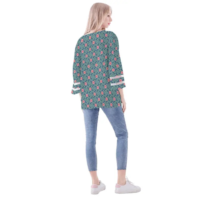 Teal floral chiffon blouse with bell sleeves and delicate lace patching cuffs over jeans
