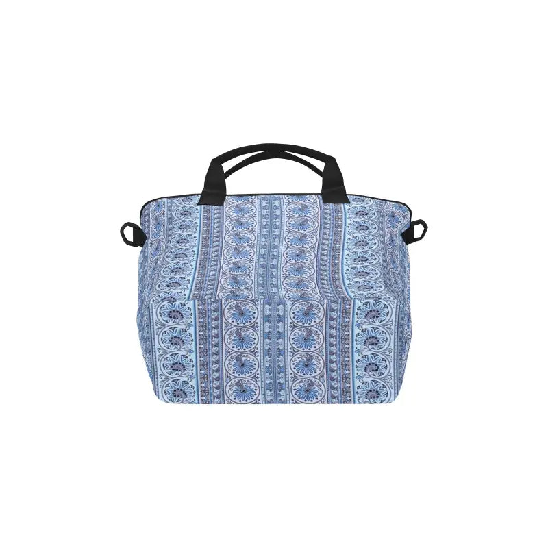 Blue and white print insulated tote bag with black handles and detachable strap