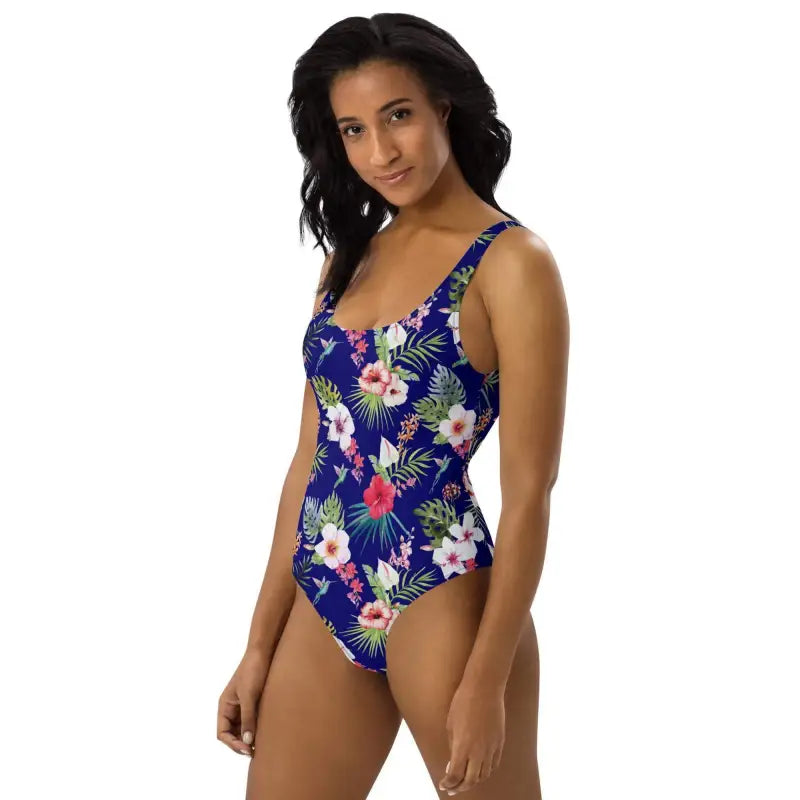 Floral patterned Hawaiian one-piece swimsuit, perfect for feeling like a beach goddess
