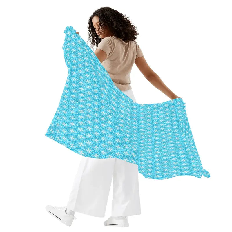 Bright blue fabric with white flowers for a stylish women’s sarong bikini cover