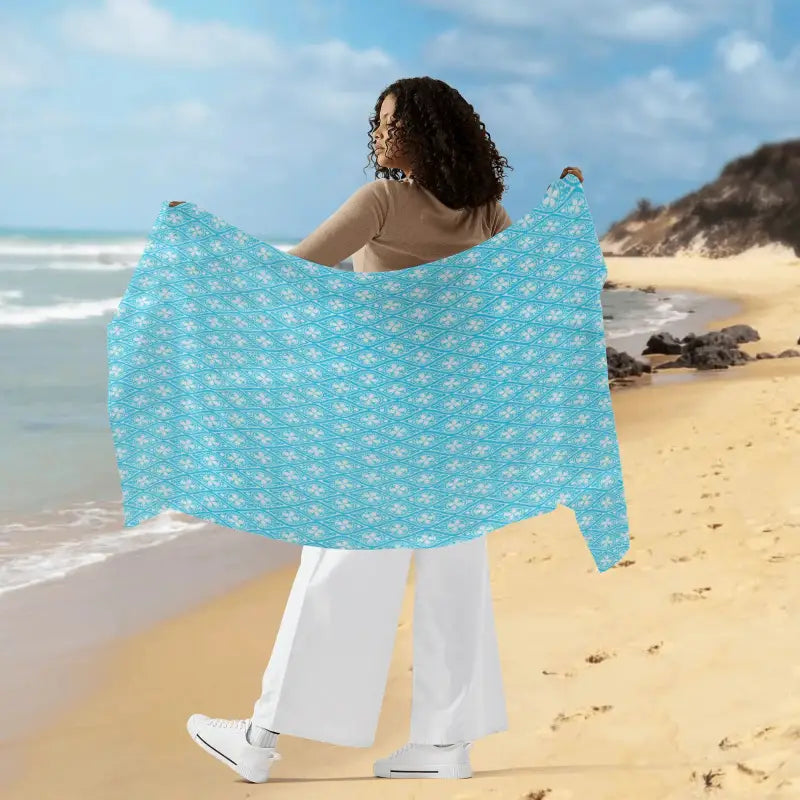 Turquoise beach towel with fish pattern perfect for women’s sarong bikini adventures