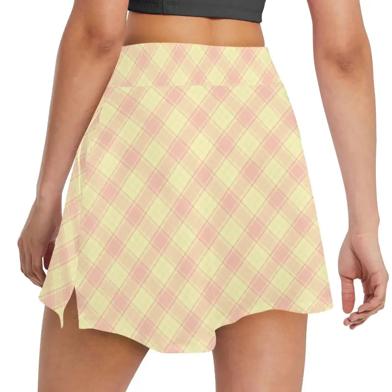 Checkered mini skirt with yellow and pink pattern, perfect women’s plaid athletic look