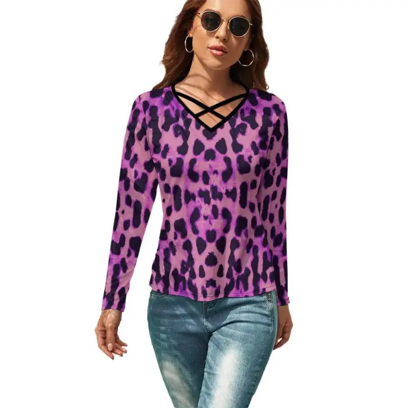 Purple leopard print v-neck long sleeve top with criss-cross neckline perfect for wild style