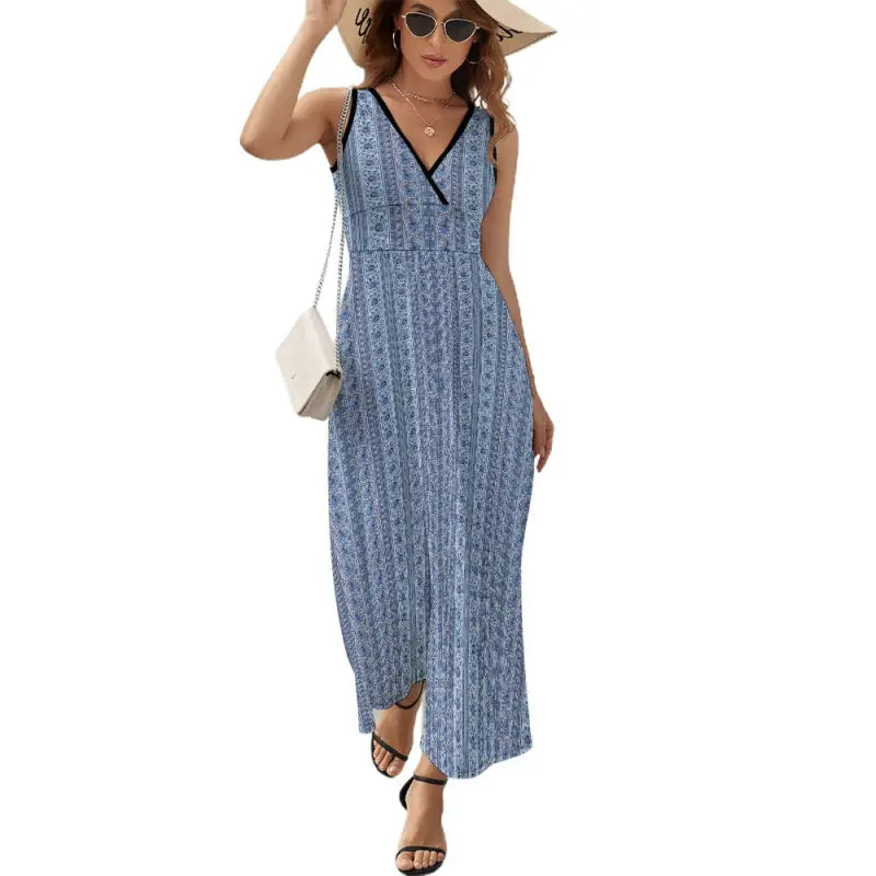 Blue stripe sleeveless maxi dress with V-neckline and black trim, perfect for summer style